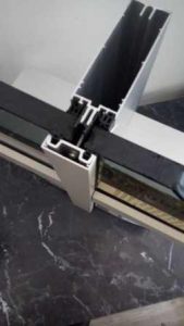 Stick system curtain wall installation