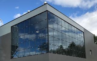 Types of modern curtain wall glass façade implementation methods